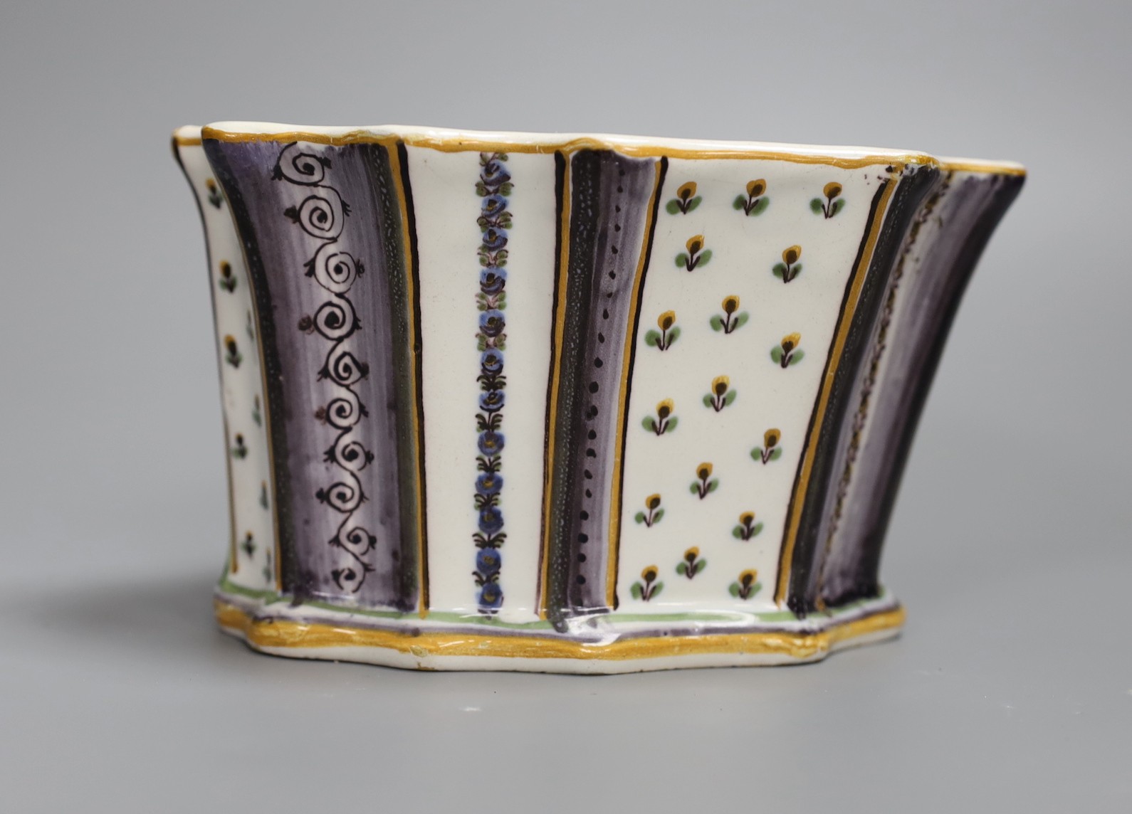 A French polychrome faience bough pot, late 18th century, 19cm wide